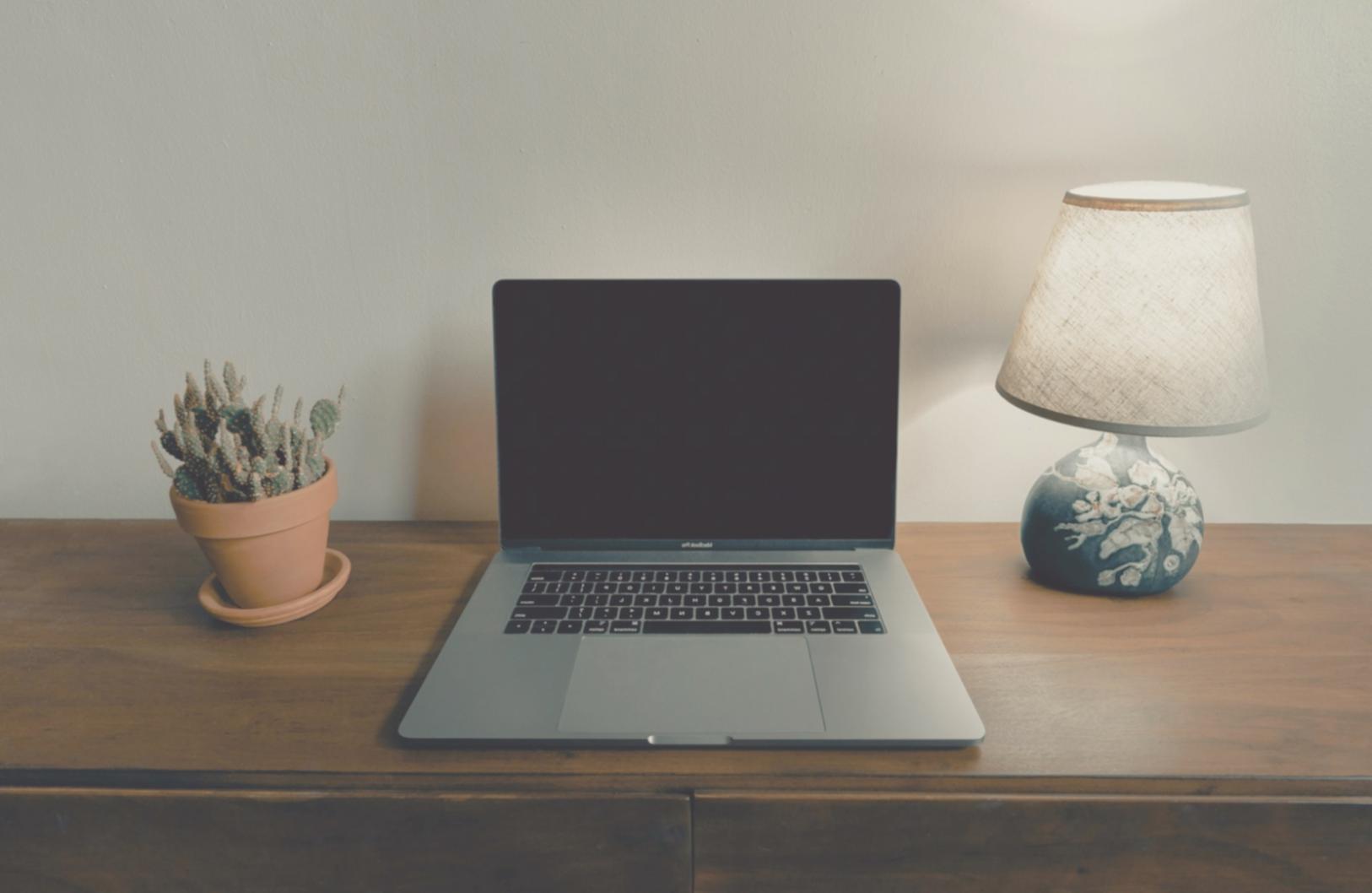 Mobile developer analyzing app performance metrics on multiple devices